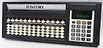 Suntory combined soroban & electronic calculator